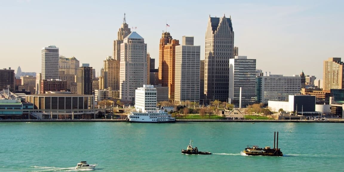 View of a Michigan city skyline with a river in the foreground